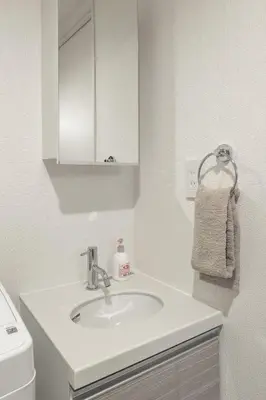 a bathroom with a sink and a white cabinet at Marvelous Koiwa - Vacation STAY 44643v in Tokyo