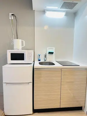 a kitchen with a microwave and a sink at Marvelous Koiwa - Vacation STAY 44643v in Tokyo