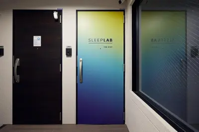 a pair of elevators in a building with at SLEEPLAB THE STAY Nishi-Shinjuku - Vacation STAY 89579v in Tokyo