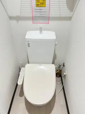 a bathroom with a white toilet with a sign above it at 401 Oshiage sta 3mins walk! Wi-Fi Elevator 4pax in Tokyo