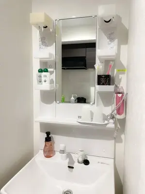 a white bathroom with a sink and a mirror at *301 Oshiage sta 3mins walk! Wi-Fi Elevator in Tokyo