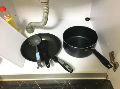 a kitchen counter with a frying pan and a bowl at *301 Oshiage sta 3mins walk! Wi-Fi Elevator in Tokyo