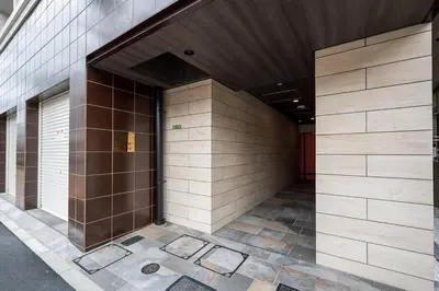 a hallway of a building with brown tiles at \u30ab\u30fc\u30b5\u30d6\u30e9\u30f3 in Tokyo