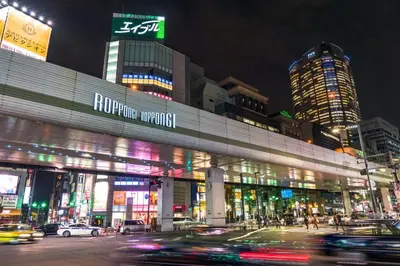 a city at night with cars on the street at EDIFICE SHIBUYA301 in Tokyo