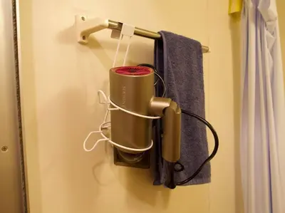 a coffee pot on a towel rack in a bathroom at The Hotel SPACE \u4e0b\u5317\u6ca2 in Tokyo