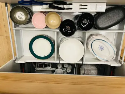 a drawer filled with plates and bowls and pans at Ueno house-TT0135 in Tokyo