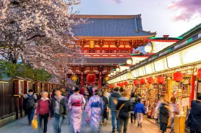 a crowd of people walking through a market with a building at 503 Oshiage sta 3mins walk! Wi-Fi & Elevator 4pax in Tokyo