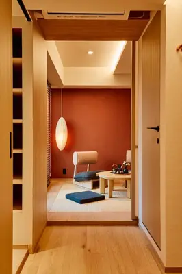 a hallway with a dining room and a table at LiveGRACE Hotel Azabu \u9ebb\u5e03\u829d\u516c\u5712 in Tokyo