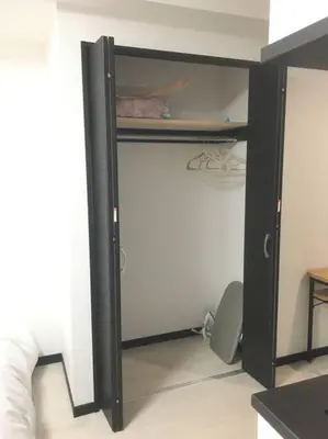 a closet with a black door in a room at *201 Oshiage sta 3mins! Wi-Fi & Elevator 4pax in Tokyo