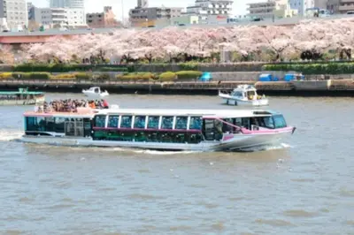 a boat on a river with people riding on it at 5mins from JR Kinshicho! Near Asakusa&Skytree! in Tokyo