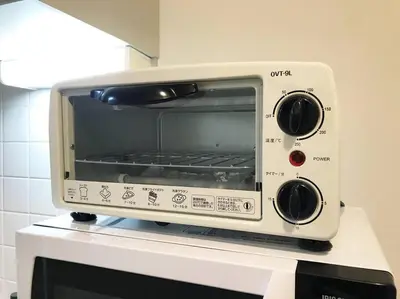 a toaster oven sitting on top of a counter at 5mins from JR Kinshicho! Near Asakusa&Skytree! in Tokyo
