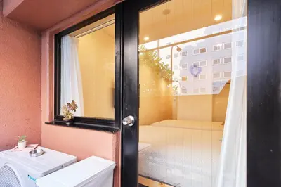 a bathroom with a shower and a toilet and a sink at 新宿繁华市中心艺术公馆/交通便利/徒步三分钟伊势丹/商务出行便利/免费Wi-Fi in Tokyo