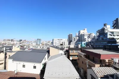 a view of a city skyline with buildings at AIC\u6c60\u888b502 in Tokyo