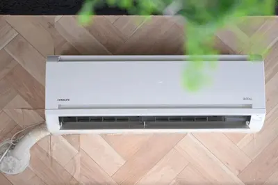 a microwave oven sitting on top of a wooden floor at AIC\u6c60\u888b502 in Tokyo