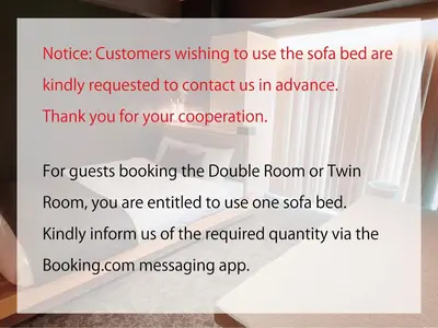 a sign that reads notice customers wishing to use the olo bed are at HOTEL TOMOS ASAKUSA in Tokyo