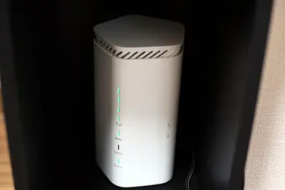 a white object is sitting in a black refrigerator at EMA House 4P Free Wifi! in Tokyo