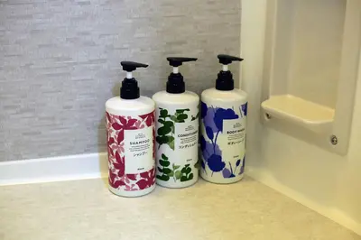 three bottles ofodorizers sitting on a bathroom counter at EMA House 4P Free Wifi! in Tokyo