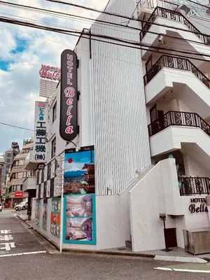 a building with a sign on the side of it at Sakura Bella Ikebukuro in Tokyo