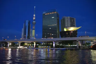 a city at night with a bridge and buildings at 1 Night 1980 Hostel Tokyo Asakusa Simple Stay in Tokyo