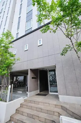 a building with stairs in front of a building at Regnocomfort Asakusa 3 - Vacation STAY 57925v in Tokyo