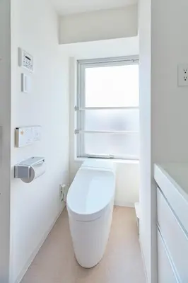 a white bathroom with a toilet and a window at Regnocomfort Asakusa 3 - Vacation STAY 57915v in Tokyo