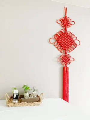a red ornament hanging on a wall with a basket at Shinjuku 2min walk! Shinjuku kabukicho \u6b4c\u821e\u4f0e\u753a! \u8f66\u7ad9\u6b65\u884c2\u5206! 2\u4e2a\u5367\u5ba4\u516c\u5bd3! \u65b0\u88c5\u4fee\u516c\u5bd3!\u5e72\u6e7f\u5206\u79bb! \u667a\u80fd\u9a6c\u6876! \u9ad8\u901f\u65e0\u9650\u5236\u7f51\u8def1001 in Tokyo