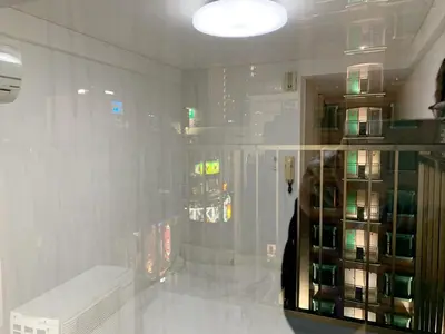 a reflection of a person in a window of a room at Central Shinjuku/Shinjukukicho/JR Shinuku Station 3 min' walk/新宿中心 新宿歌舞伎/912 in Tokyo