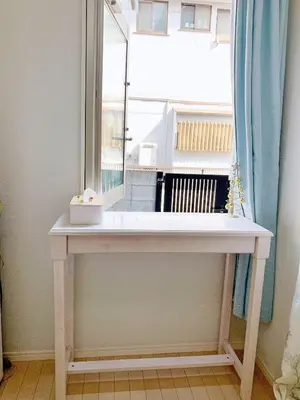 a white console table in front of a window at JR t akadababa subway 5 mins walk! Newly building \u65b0\u7bc9! \u9ad8\u7530\u99ac\u5834\u99c5 \u5f92\u6b69\u570f\u5185\u5927\u4eba\u6c17! Shinjuku\u65b0\u5bbf\u5708!\u9ad8\u901f\u65e0\u9650\u5236Wi-FI C1 in Tokyo