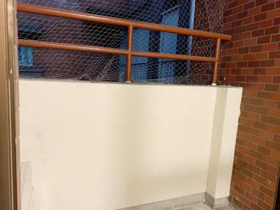 a brick wall with a fence on top of a white wall at Shinjuku Center\u65b0\u5bbf\u4e2d\u5fc3! !Shinjuku Kabukicho! 3min walk! JR \u65b0\u5bbf!\u5730\u94c1\u7ad9\u6b65\u884c3\u5206! \u65b0\u5bbf\u6b4c\u821e\u4f0e!\u8457\u540d\u8fde\u9501\u5927\u578b\u516c\u5bd3!\u4e00\u5c4224\u5c0f\u65f6\u4fdd\u5b89\u5e38\u9a7b! 616 in Tokyo