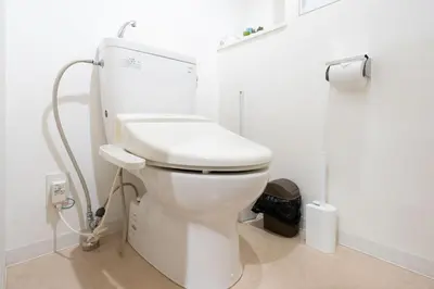 a bathroom with a white toilet in a room at ANGO Shibuya I in Tokyo
