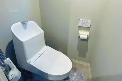 a bathroom with a white toilet in a room at Tokyo Asakusa New Condo Sensoji-6min in Tokyo