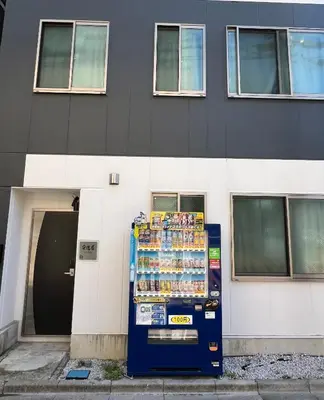 a vending machine in front of a building at Tokyo Asakusa New Condo Sensoji-6min in Tokyo