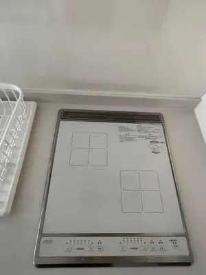 a digital tablet sitting on top of a refrigerator at \u30a2\u30f3\u30c9\u30b9\u30c6\u30a4\u4e0a\u9ad8\u75302\u4e01\u76ee in Tokyo