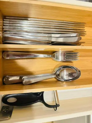 a drawer filled with lots of silver utensils at Shinjuku-Kabukicho-SJ0012 in Tokyo