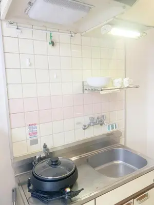 a kitchen with a pot on top of a sink at Shinjuku Area/Nishi-Shinjuku Gochome subway 6 minutes walk/西新宿五丁目车站步行6分钟 211 in Tokyo