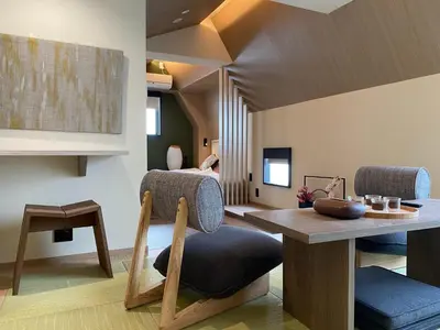 a living room with a chair and a table at LiveGRACE Mabuji Park Hotel - Vacation STAY 51973v in Tokyo
