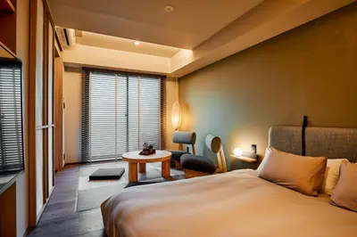 a hotel room with a bed and a table at LiveGRACE Mabuji Park Hotel - Vacation STAY 51799v in Tokyo