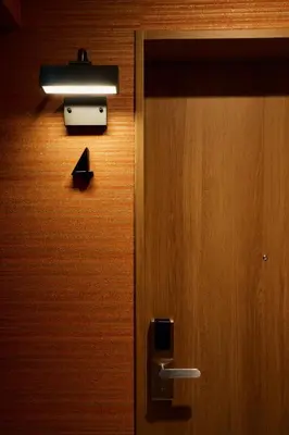 a close up of a door with a light on it at LiveGRACE Mabuji Park Hotel - Vacation STAY 51965v in Tokyo