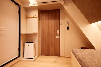 a small hallway with a door in a room at LiveGRACE Mabuji Park Hotel - Vacation STAY 51980v in Tokyo