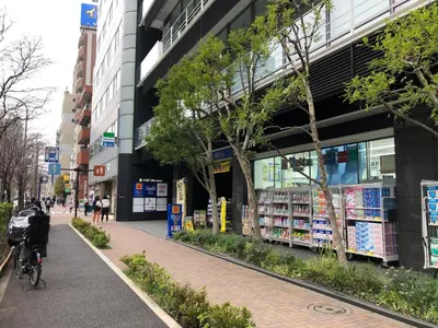 a building with a bike parked in front of it at LiveGRACE Mabuji Park Hotel - Vacation STAY 51943v in Tokyo