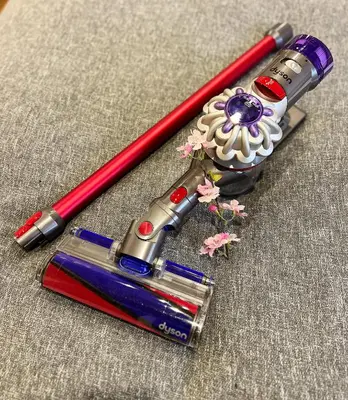 two pens and a flower on a table at Akihabara K in Tokyo