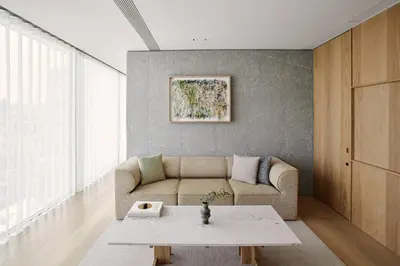 a living room with a couch and a table at TRUNK(HOTEL) YOYOGI PARK in Tokyo