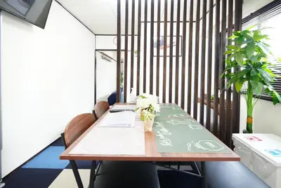 a dining room table with chairs and a tableablish at Ryogoku 601 Private Cozy Stay 4min Walk Station Asakusa Nearby in Tokyo