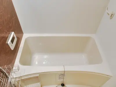 a white bath tub in a bathroom with a sink at 2023 Open Shinjuku Okubo 5mins to 2stns 200M WIFI in Tokyo