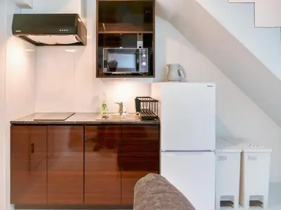 a kitchen with a sink and a refrigerator at 2023 Open Shinjuku Okubo 5mins to 2stns 200M WIFI in Tokyo