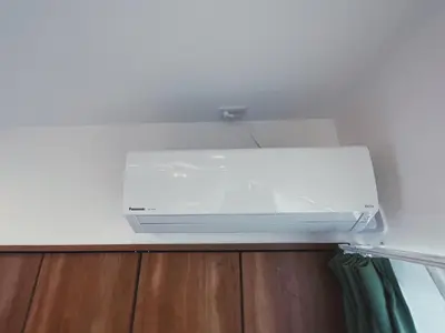 a microwave oven sitting on top of a shelf at KUMOMA Entire Apartment Skytree \u8cb8\u5207 \u6574\u5957\u51fa\u79df Max4 People \u6700\u59274\u4eba 8min to sta \u8f66\u7ad9\u6b65\u884c8\u5206\u949f 36m2 in Tokyo