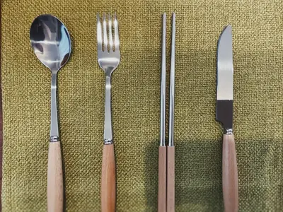 a group of utensils sitting on top of a table at KUMOMA Entire Apartment Skytree \u8cb8\u5207 \u6574\u5957\u51fa\u79df Max4 People \u6700\u59274\u4eba 8min to sta \u8f66\u7ad9\u6b65\u884c8\u5206\u949f 36m2 in Tokyo