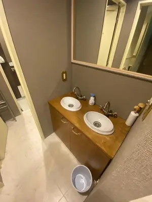 a bathroom with two sinks and a mirror at 54Journey Roppongi in Tokyo