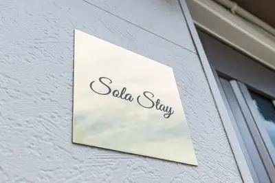 a sign on the side of a building at Sola Stay Kanegafuchi in Tokyo