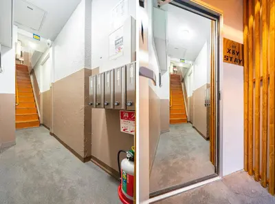 a hallway in a school with a mirror and stairs at NEW OPEN! Nearest JR Shinokubo and JR soubu line HIgashinakano, shinjuku 5 minute ginza 25 minute asakusa 35 minute in Tokyo